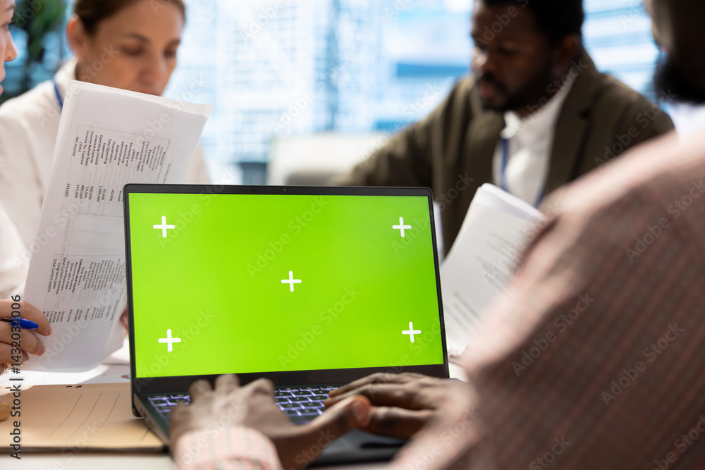 Poster business associates in a meeting using isolated chroma key display, working on resource allocation p