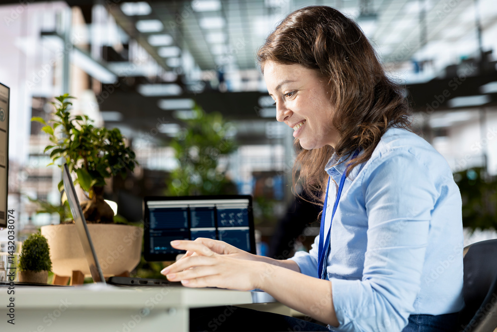 Poster office employee examining performance metrics numbers at the workplace, working on budget analysis a