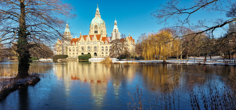The historic and elegant architecture is beautifully reflected in the serene, calm lake surface Maschpark Hannover