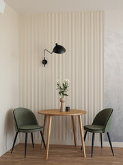 A Chic Minimalist Dining Space Featuring Stylish Green Chairs and an Elegant Floral Centerpiece © diczman