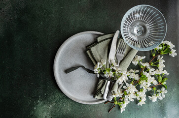 Elegant table setting with floral accent and minimalist style