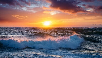 Fototapeta premium dramatic sunset over crashing waves on the ocean