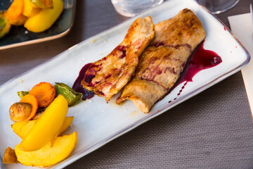 Iberian pork in sweet wine and vegetable sauce. High quality photo