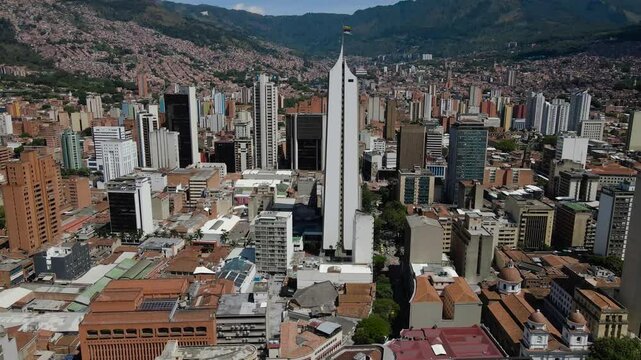 Aerial footage of the urban buildings at the downtown of Medellin city, Colombia on a sunny day