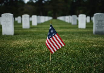 The american flag waves at a cemetery, honoring fallen heroes and their ultimate sacrifice.