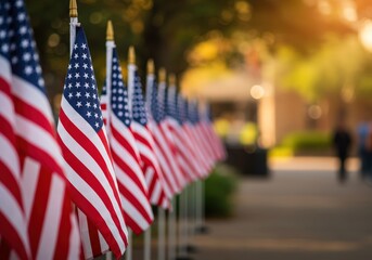 A beautiful outdoor scene showcases several american flags, standing tall in a row.