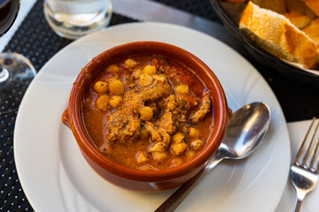 Beautifully served dish of callos a la madrilena with chickpeas and chorizo