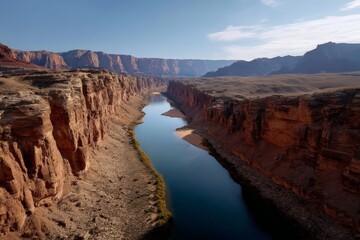 Majestic Canyon Carved by River Surrounded by Deep Red Cliffs