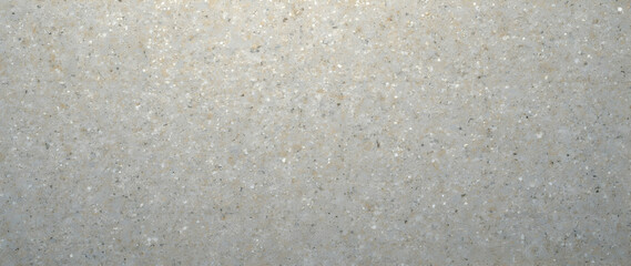 Obraz premium Close-up of Smooth Beige Speckled Surface Texture