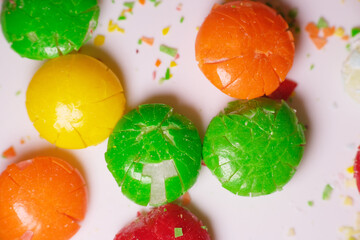 Close up texture of crushed chewy candy coated with flavour sugar