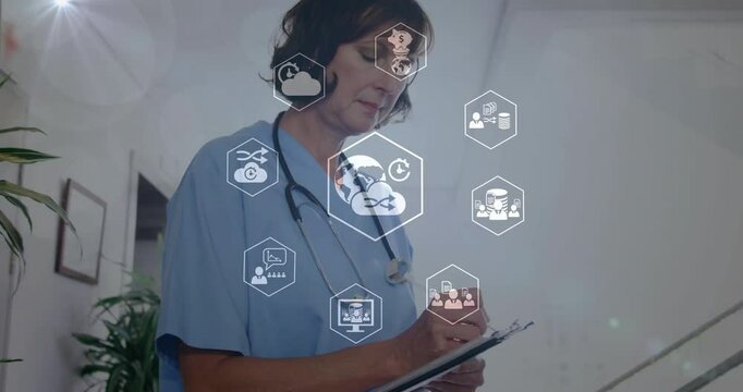 Female nurse writing on clipboard in medical corridor, showing cloud icons and analytics overlays