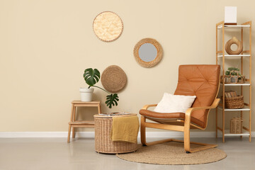 Interior of room with armchair, shelving unit and mirror