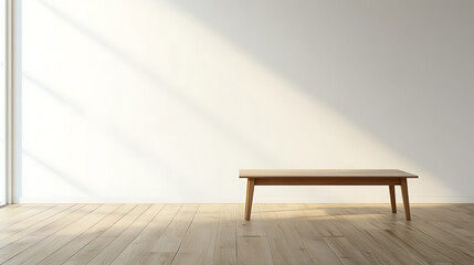 A wooden bench sits in a large, empty room with a white wall