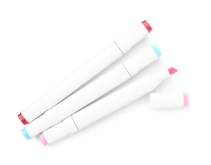 Double-sided marker pens on white background, top view