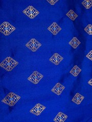 Royal Blue Fabric with Gold Geometric Pattern Elegant Textile Design