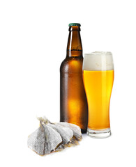 Beer and dried cod fish fillets isolated on white