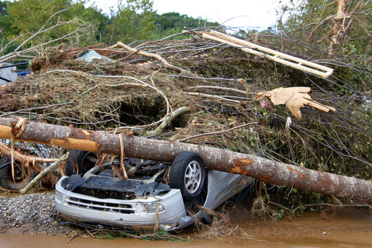 Upside Down Car Crushed Under Tree During Tropical Storm Helene