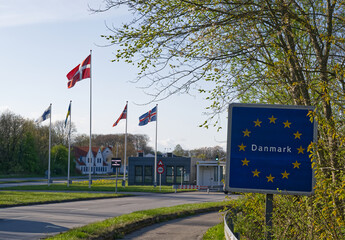Border Crossing into Denmark with Flags and EU Sign
