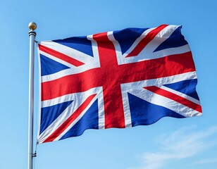 United Kingdom Flag Waving in the Wind Against Blue Sky
