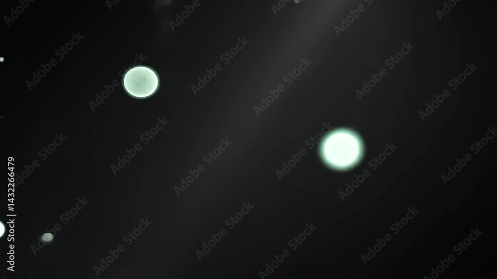 Poster captivating glowing particles floating in dark space, creating a mystical and ethereal atmosphere fo