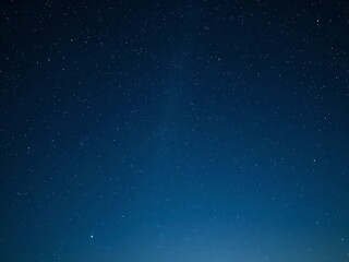 Naklejka premium blue space background. space, sky, night, star, stars, galaxy, universe, dark, starry, astronomy, light, nebula, blue, backgrounds, christmas, snow, water, starfield, cosmos, black, science, motion, i