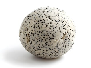 A perfectly round scoop of creamy dragon fruit ice cream is speckled with black sesame seeds on a white background.