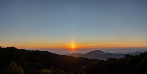 Sunrise sky over mountains and valleys, in north of Thailand