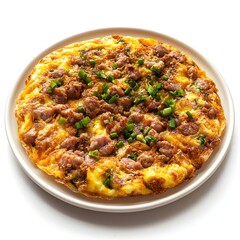A delicious savory pork and egg omelet is presented on a white plate against a bright white background.