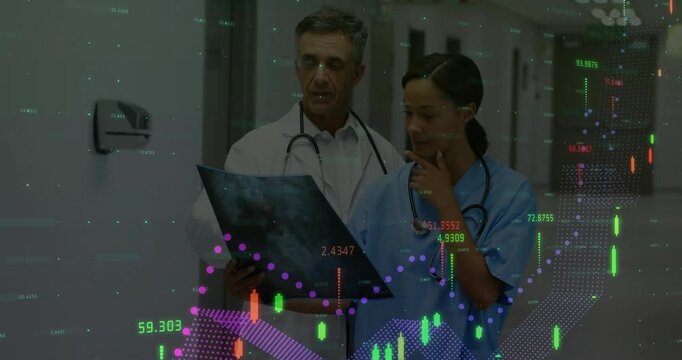 female nurse and male doctor examining X?ray in medical corridor, with floating charts and data