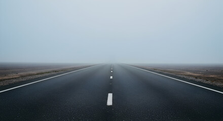 Fototapeta premium Misty Horizon Endless Road Disappears Into the Dense Fog Landscape