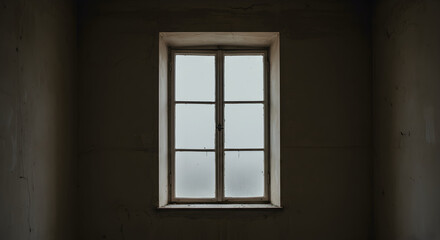 Illuminated Window In A Dark Interior Room Casting Shadows And Soft Light