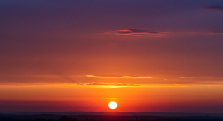 Fototapeta premium Vivid Sky At Sunset With Hues Of Orange And Purple At Twilight