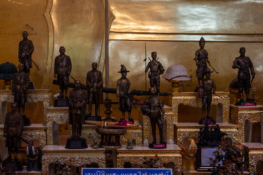 Singburi, Thailand, March 23, 2025, Detailed display of bronze statues at Wat Phra Non Chak Si Worawihan
