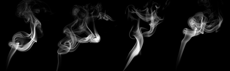 set abstract white smoke isolated on a black background. concept of texture mist, fog effect, and...