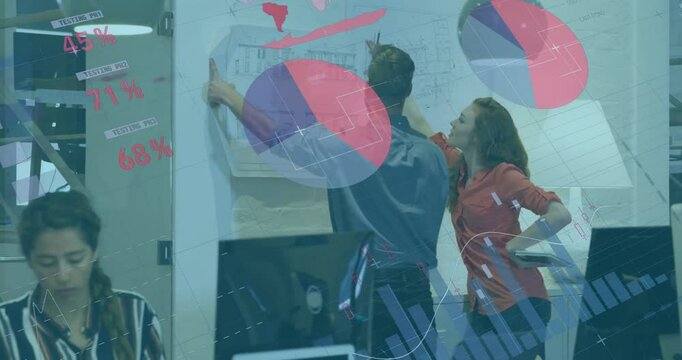 Three coworkers collaborating in business office, marking blueprints and overlaying digital charts - Powered by Adobe