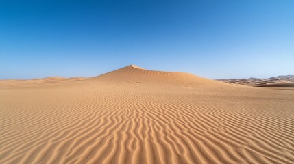 Serene desert landscape under a vast blue sky