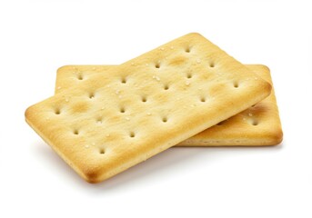 Two rectangular crackers stacked on top of each other on a plain white surface in a close up shot