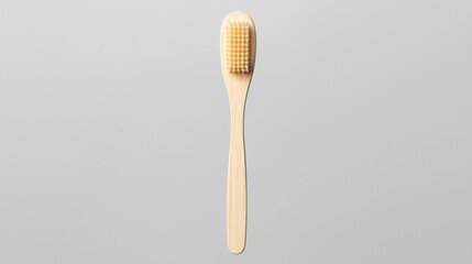 A simple bamboo toothbrush with a minimalist design, showcasing sustainable dental care.