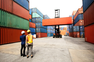 Group of professional foreman man & woman worker, business people, engineer teamwork working together at industrial import-export containers ship yard. logistic.