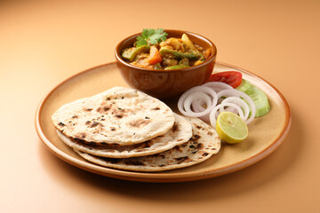 Indian food Tandoori roti or nan, Indian flat bread with Mix vegetable curry  