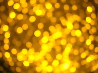 Obraz premium abstract bokeh background. light, christmas, bokeh, blur, gold, lights, yellow, bright, golden, orange, holiday, color, decoration, celebration, xmas, glow, shiny, design, pattern, glowing, new, blurr