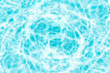 Blue water with ripples on the surface. Defocus blurred transparent blue colored clear calm water surface texture with splashes and bubbles. Water waves with shining pattern texture background.