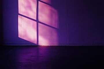 A gentle purple hue spreads across a dark studio wall with mild reflections.