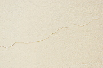 crack on white wall from earthquake, construction industry
