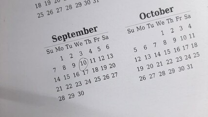 marking 10 September date on the calendar	
