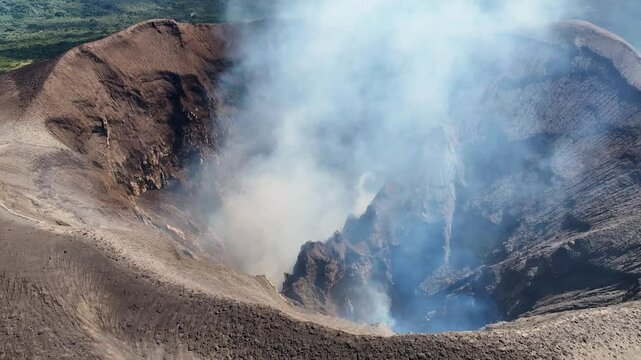 Steam from Mount Yasur active volcano, aerial wide of crater rim. Tanna Island, Vanuatu