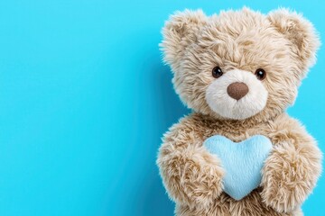 Obraz premium Adorable Teddy Bear Soft Toy: Cuddly Friend & Childhood Keepsake with Blue Heart Decoration