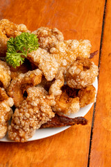 Indulge in Deliciously Crispy Pork Cracklings Served on a Beautifully Arranged Platter
