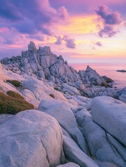Stunning Coastal Sunset Landscape: Granite Rocks and Serene Ocean at Dusk