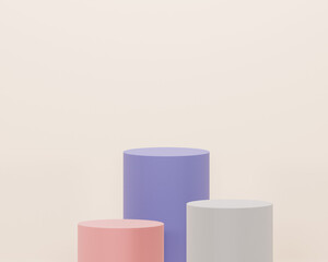 Fototapeta premium Three Pastel-Colored Cylindrical Podiums for Product Display